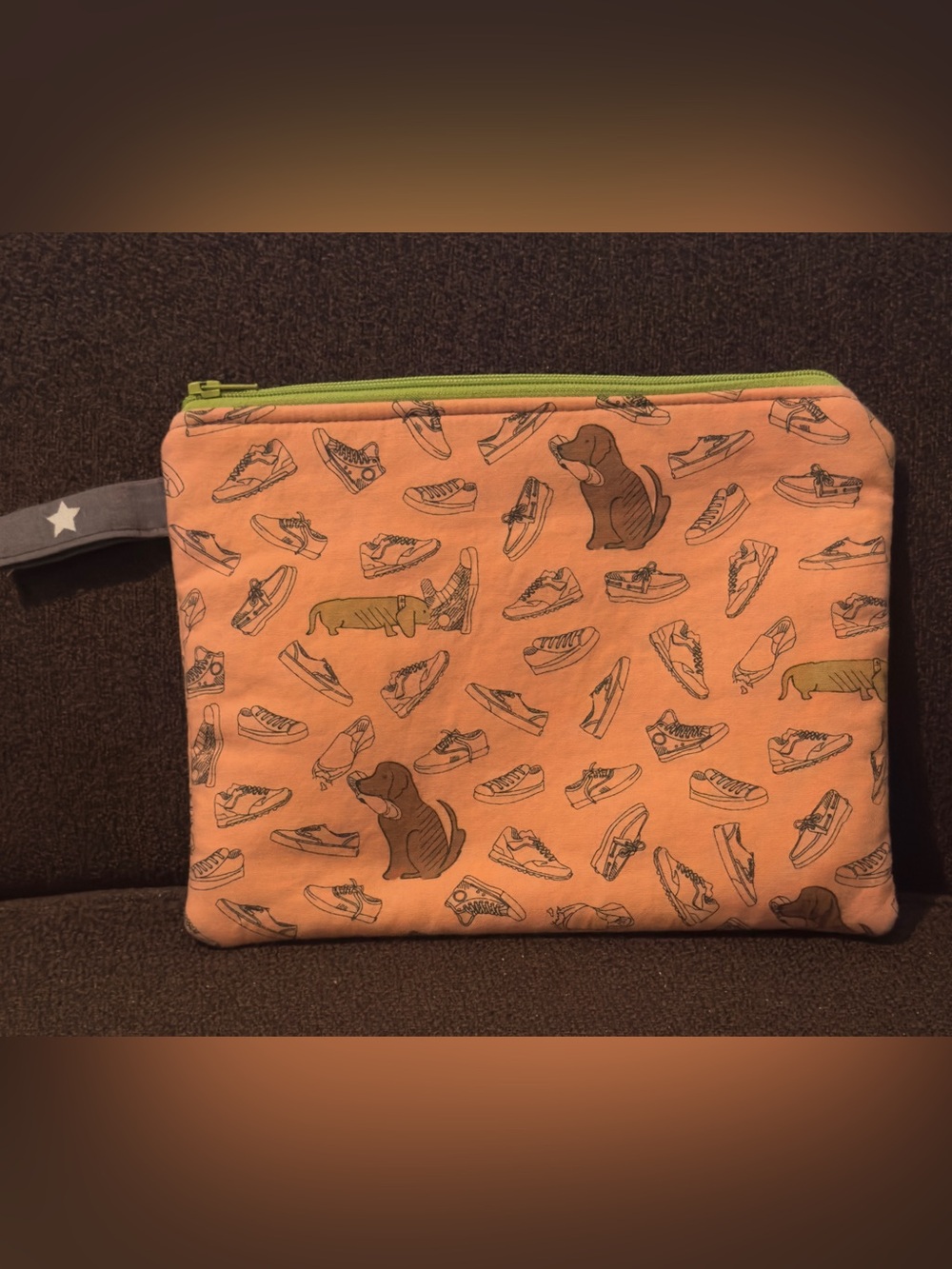 Pet Print Peach Zipper Pouch with Green Trim. Good condition.